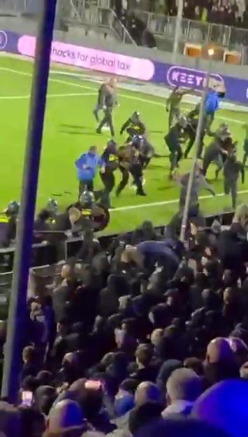 Cup Clash Erupts into Chaos as Riot Police and Dogs Step In to Control Mass Brawl