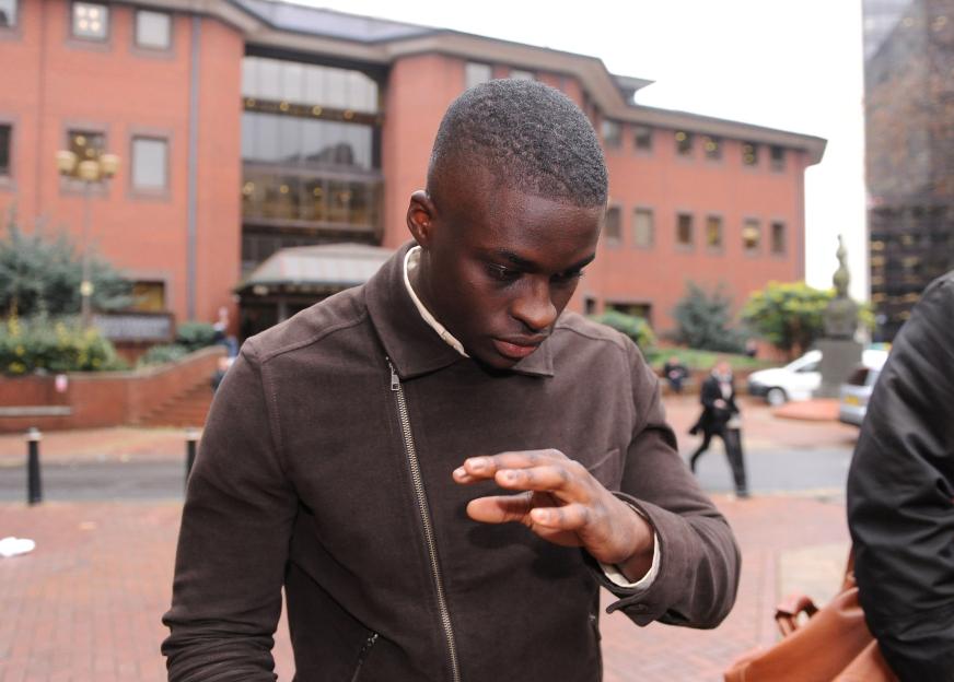 Michael Boateng leaving Birmingham Crown Court after facing charges of conspiracy to defraud.