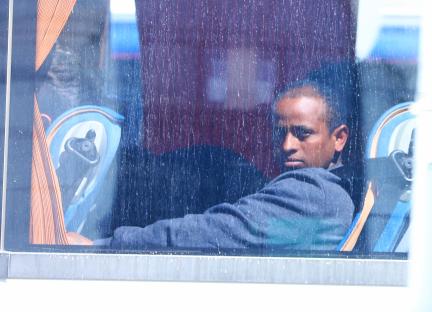 Migrants on a bus in Dover, UK.