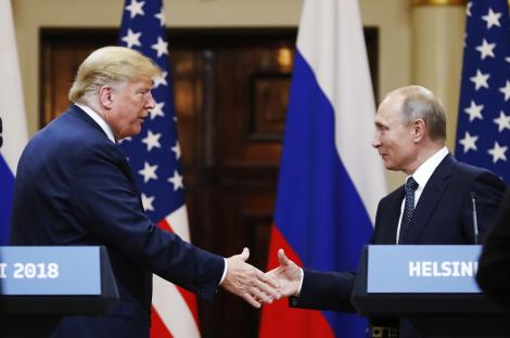 President Trump and President Putin shaking hands in Helsinki.