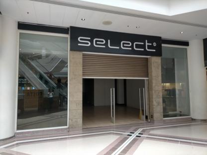 Caption: GV of Select fashion store at West Orchards Shopping Centre, Coventry, which closed in June 2024