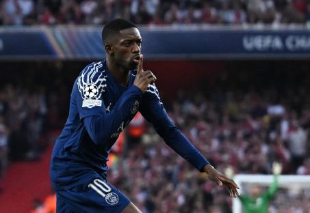 Ousmane Dembele celebrating a goal.