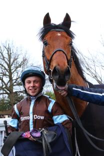 Jockey Levi Williams with Mr Scaramanga after a race win.