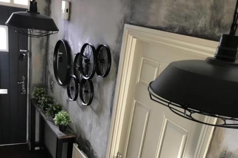 Trolls call me ‘crazy’ for making my home look ‘fire-damaged and mouldy’ – but I don’t care, I love my ‘bizarre’ pad