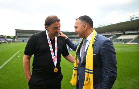 Daniel Farke, Leeds United manager, and Paraag Marathe, Leeds United chairman, embrace after a championship win.