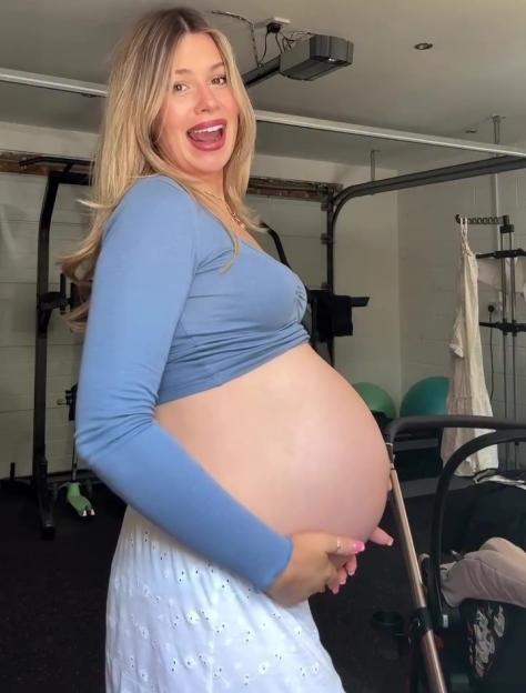 Pregnant woman packing hospital bag.