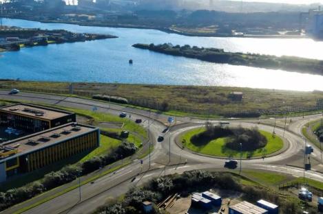 Aerial view of Port Talbot harbor and roundabout.