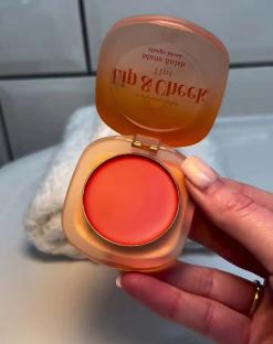 Lip and cheek tint in a compact.