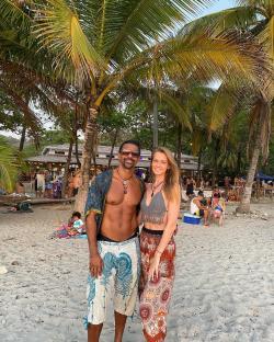 David Haye and Sian Osborne on a beach.