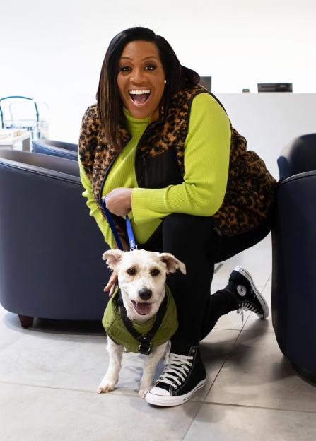 Alison Hammond with a dog at Battersea Dogs and Cats Home.