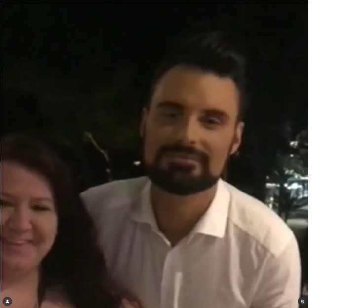 A man and woman posing for a photo.