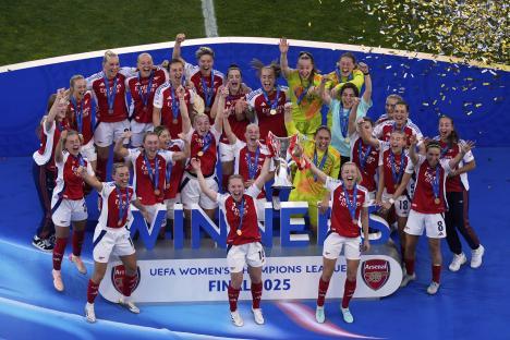 Arsenal women's soccer team celebrating their Champions League victory.
