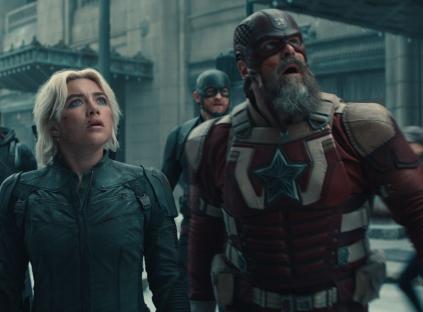 Film still of the Thunderbolts team walking through a city.