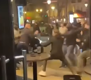 A street brawl at night.