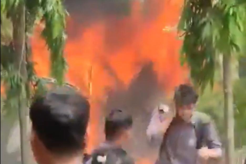 Military jet crashes into school sparking explosion and killing at least one as vid shows crowds rush to blazing wreck