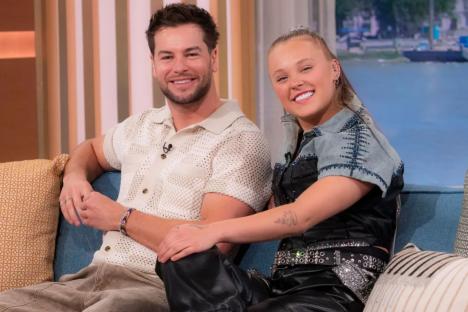 Fuming Chris Hughes defends age gap with JoJo Siwa after being branded ‘creepy’