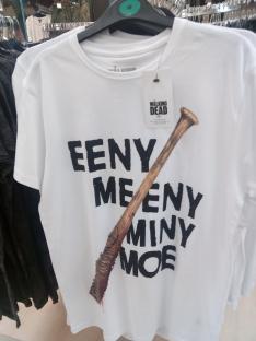 White t-shirt with "Eeny meeny miny moe" and a barbed wire-wrapped baseball bat printed on it.