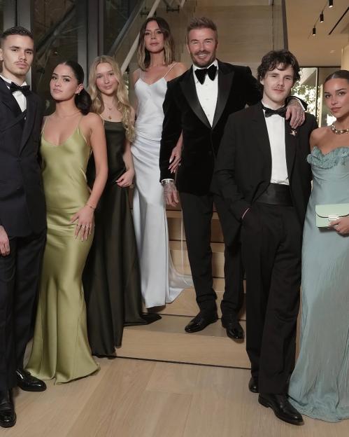 David Beckham and his family at a celebratory event.