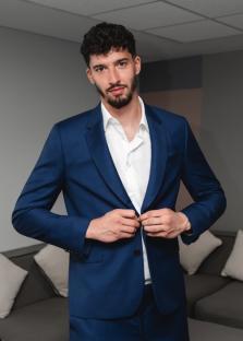 Man in a blue suit.