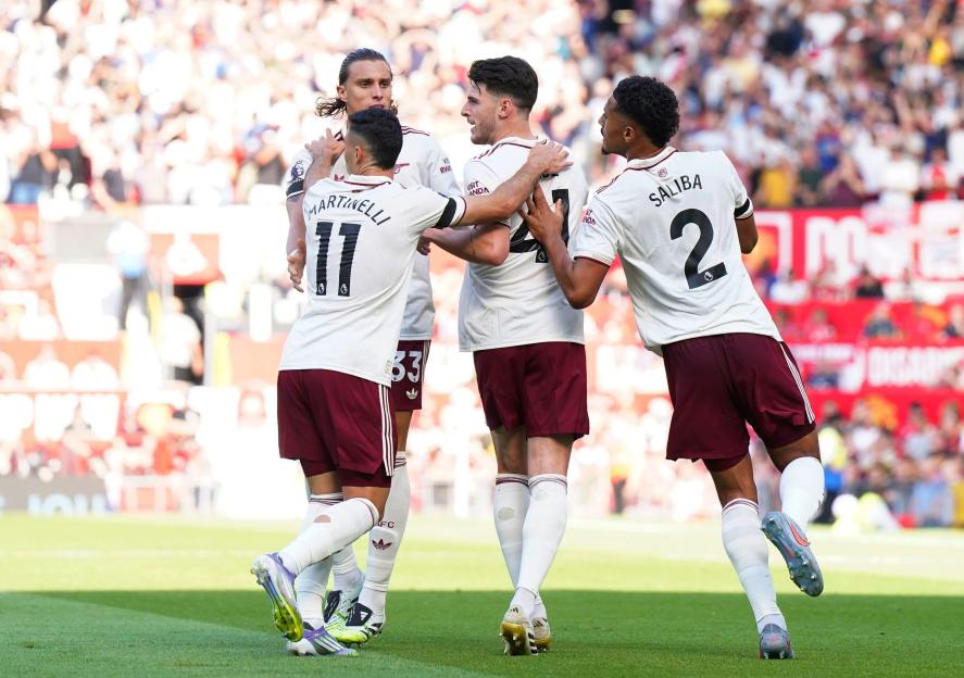 Arsenal players celebrating a goal.