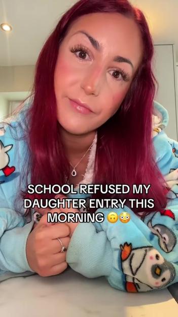 Woman reporting that her daughter was refused entry to school due to her uniform.