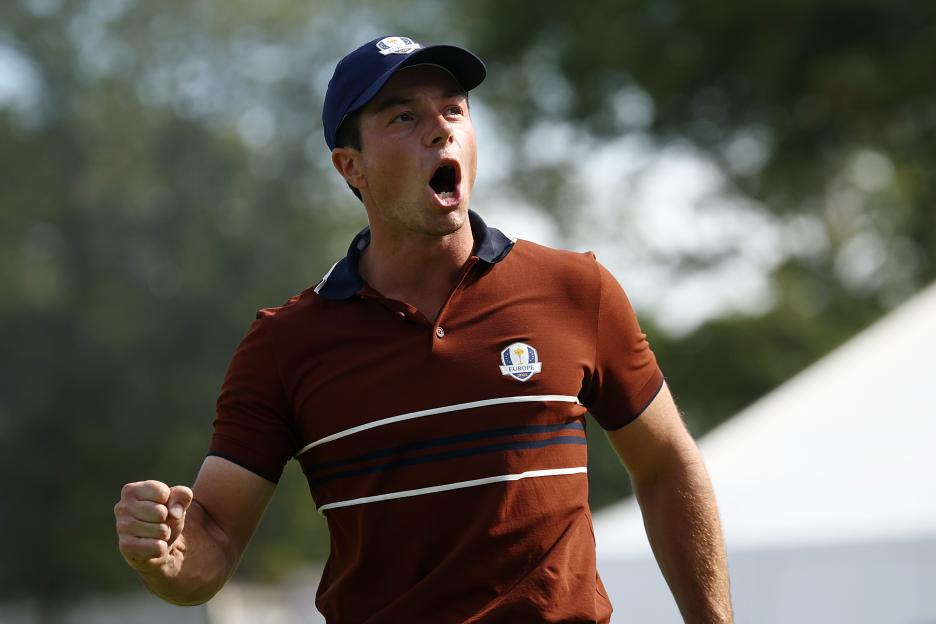 Viktor Hovland of Team Europe reacts after winning the 14th hole at the 2025 Ryder Cup.