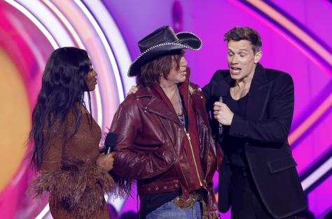 AJ Odudu, Mickey Rourke, and Will Best at a Celebrity Big Brother event.