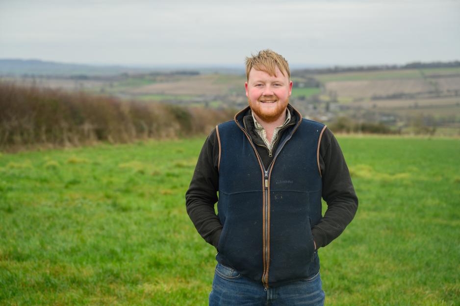 Kaleb Cooper in a field.