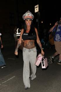 Katie Price leaving a venue wearing a jeweled crown and crop top.