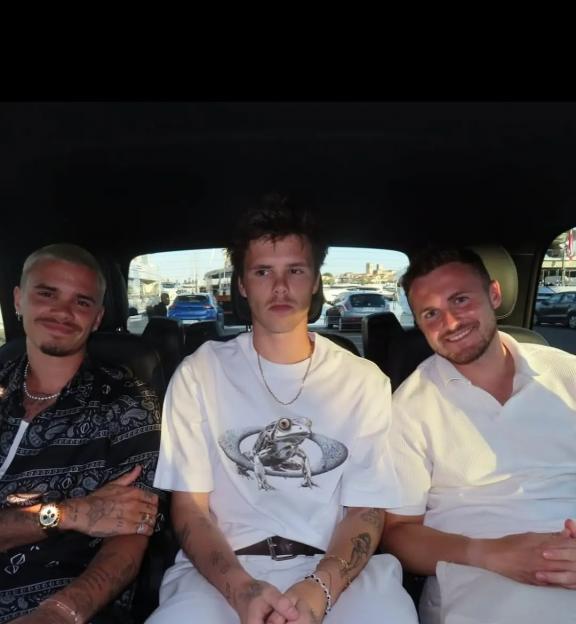 Mitchell Curry with Romeo Beckham and Cruz in a car.