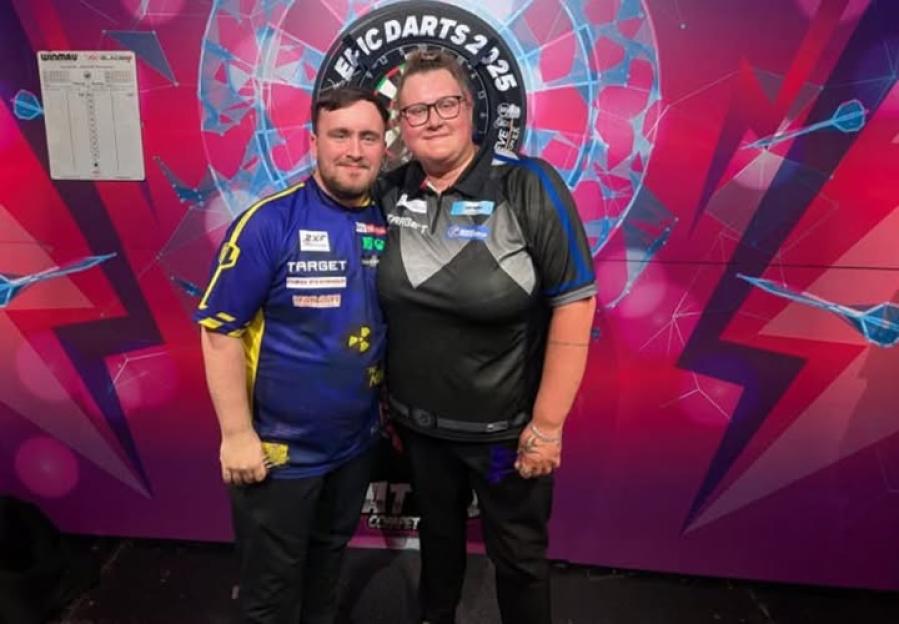 Luke Littler and Beau Greaves posing together.