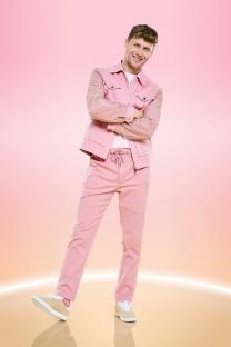 Jamie Borthwick, a contestant on Strictly Come Dancing, in a pink outfit.