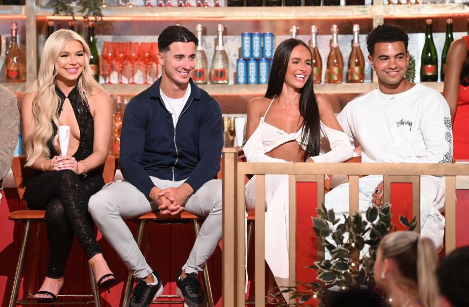 Four Love Island contestants on a TV show.