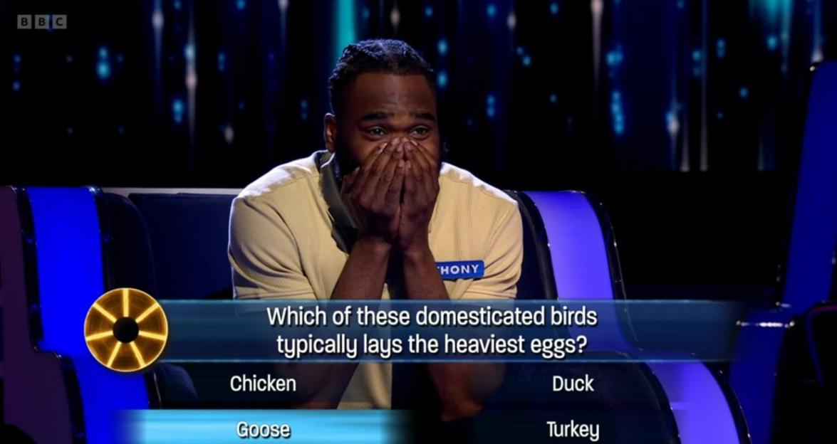 A contestant on The Wheel game show reacting to winning £72,000.
