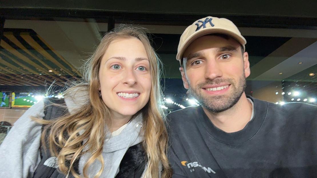 Sara and Colin Smith smiling for a selfie.