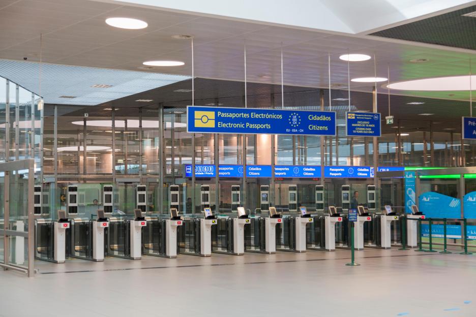 Electronic passport control gates at an airport.
