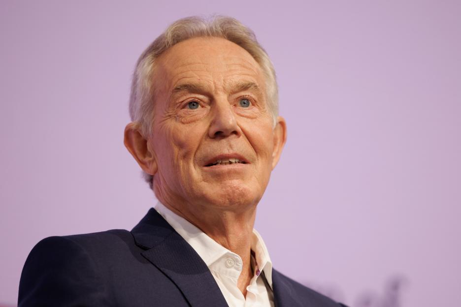 Tony Blair speaking at a conference.