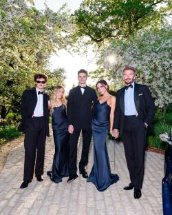 The Beckham family posing for a photo.