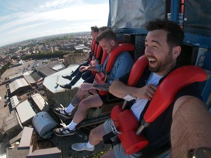 Four men on a Blackpool Launch Pad ride.