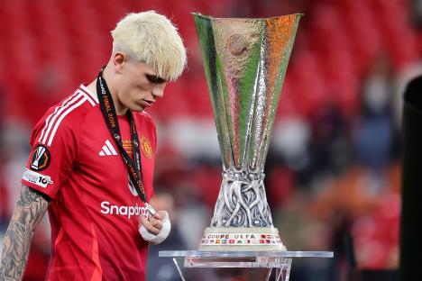 Alejandro Garnacho of Manchester United holding a runner-up medal after the Europa League Final.
