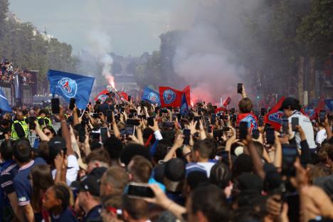Paris Saint-Germain fans celebrating their UEFA Champions League victory.