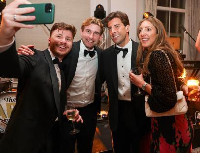 Group selfie at a charity event.