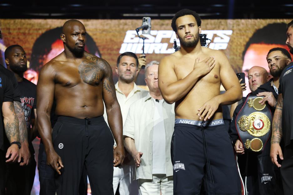 Dillian Whyte and Moses Itauma at a weigh-in.