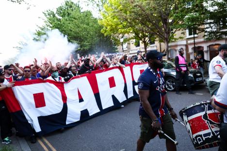 PSG supporters carrying a