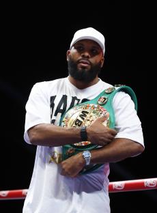 Badou Jack holding his WBC World Cruiserweight title belt.