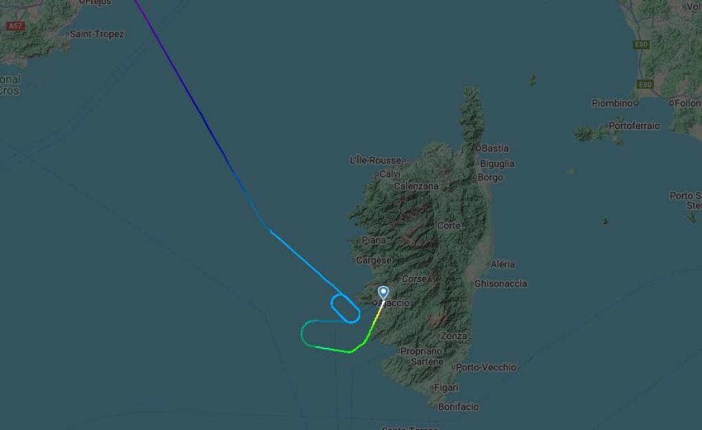 Map showing a flight path with a holding pattern near Ajaccio, Corsica.