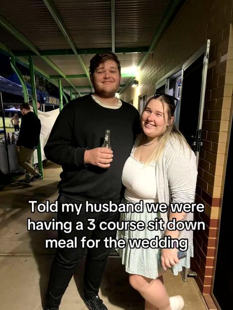 Couple at wedding reception; the bride's caption says they had a fast food buffet instead of a planned three-course meal.