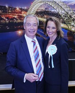 Nigel Farage and Sarah Pochin of Reform UK after a by-election win.