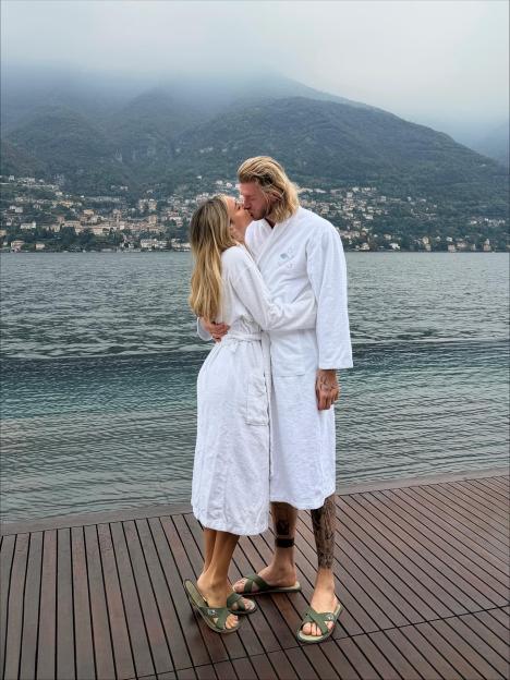 Diletta Leotta and Loris Karius kiss by Lake Como.