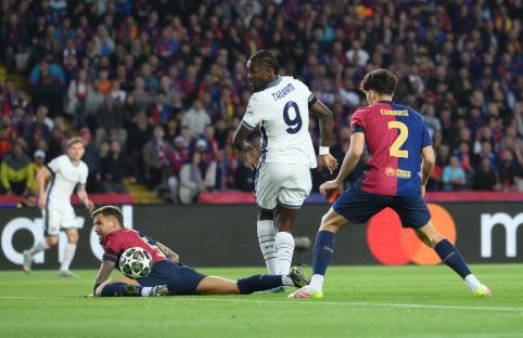 Marcus Thuram of FC Internazionale scoring a goal during a soccer match.